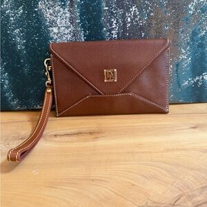 Dooney & Bourke Mini Tech Envelope Clutch in very good condition!